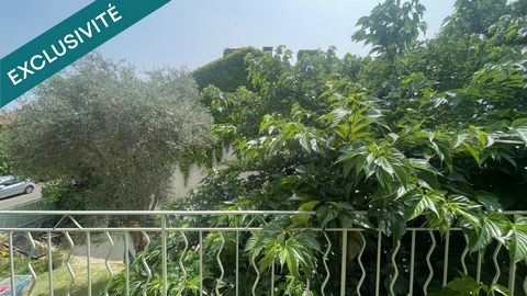 Maison de ville avec garage et jardin