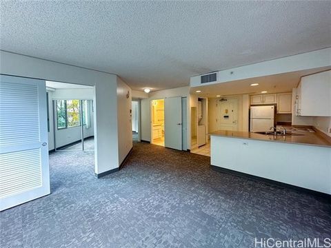 **NEW PRICE** Experience luxury living at One Kalakaua Senior Living in Apt #305, a spacious 2BD/1BA condo with stunning mountain, treetop, & pool views. Conveniently located near the elevators and emergency stairs providing easy access. Safety is pa...