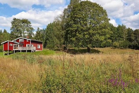 In the middle of the almost untouched nature, you can spend extremely relaxed days in this spacious holiday home. The decor leaves nothing to be desired and the bright colors remind you of spring. In addition to the terrace with a wonderful view of t...