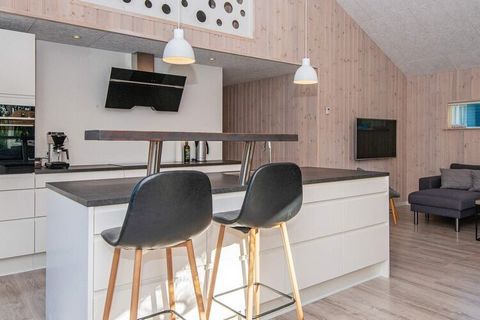 Holiday home with sauna and indoor whirlpool and large, outdoor jacuzzi located by a good beach in Fjellerup. The cottage has four good bedrooms and a good large loft. On the loft there is a game console with an associated flat screen. There is a lar...