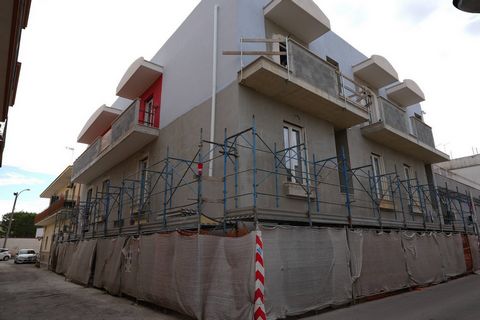 PUGLIA - TARANTO - TALSANO - NEW CONSTRUCTION SITE We offer for sale in a newly built building an apartment located on the ground floor comprising entrance hall, open living room, kitchen, laundry room, n. 2 bed rooms, bathroom with shower, double ex...