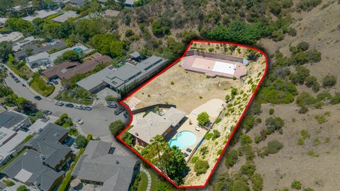 This sprawling blue-chip site of approximately 1.3 acres is mostly flat and positioned at the end of a quiet cul-de-sac in the coveted Doheny Estates. Rarely do land opportunities with this amount of flat area become available, especially in such an ...