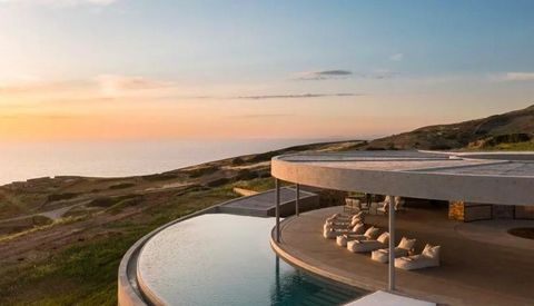 Discover this unique villa, a modernist masterpiece perched on the island of Antiparos in the Aegean Sea. With its curved architectural design, this villa offers stunning sea and mountain views. The circular roof provides shade and adds a striking to...