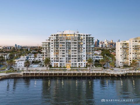 Soaking up the sun and panoramic beauty of Port Phillip Bay, this exclusive penthouse residence is the epitome of beachfront luxury. Exemplifying modern coastal design, its luxurious three-bedroom, two-bathroom layout and position on the 12th floor m...