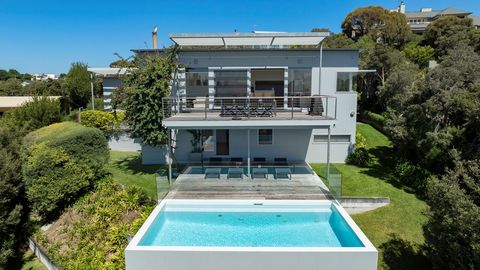 Nestled at the end of a serene laneway in an exclusive enclave, this immaculately renovated split-level home offers breathtaking panoramic coastal views on a generous 1511sqm*. The four-bedroom residence is bathed in north-facing sunlight, boasting t...