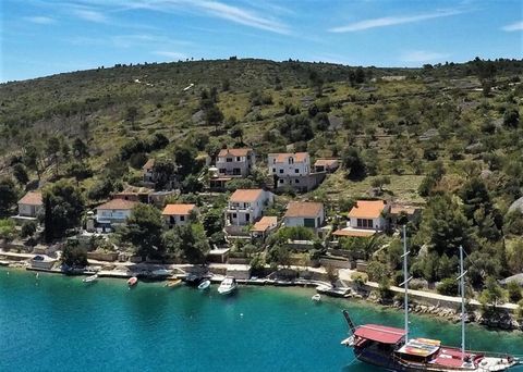 Apart-house for sale on the second row to the sea in peaceful green Bobovisce Bay near Milna! Total surface of property is 226 sq.m. Three levels. Land plot is 425 sq.m. On the lower and medium levels there are two 2-bedroom apartments, each with bat...