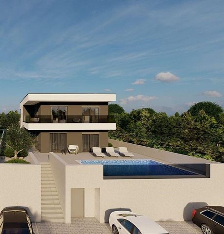 Villa au design moderne en construction à Svetvincenat! La superficie totale est de 200 m². Le terrain est de 640 m². La villa se composera d'un espace de vie avec cuisine moderne et salle à manger au rez-de-chaussée et de quatre chambres avec salles...