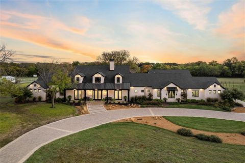 Indulge in the epitome of luxury living within this vary rare and extraordinary 1.5 story custom home, nestled on a sprawling 5 acre creek lot in the heart of Frisco. Country living with NO HOA minutes from the downtown Rail district,The PGA,The Cowb...