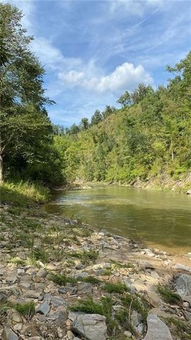 Located on pristine Talking Rock Creek, this tranquil and secluded property in the beautiful North Georgia mountains is a dream location for outdoor recreation, including fishing, hiking and kayaking. Sequoyah Club was established as a gated subdivis...
