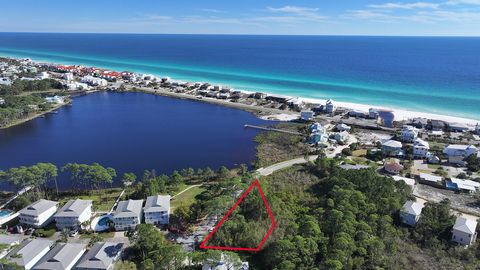 Experience the epitome of coastal living with this extraordinary beach home lot boasting unobstructed vistas of Oyster Lake and views of the shimmering Gulf. Situated on the tranquil west end of 30a, this generously sized lot offers a rare blend of s...