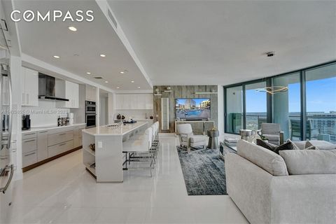 Indulge in luxurious Las Olas living with mesmerizing skyline views in this designer-remodeled residence, 03 line, best line in the building. The open floorplan offers 3 beds plus a den, two expansive terraces, 3.5 baths, a laundry room. Ensuite bedr...