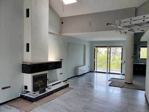 Introducing a pristine Maisonette in Agios Stefanos, spanning 157 sq.m. This newly constructed residence boasts modern elegance, featuring a spacious living room with a fireplace and kitchen on the first floor, while the ground floor hosts four bedro...
