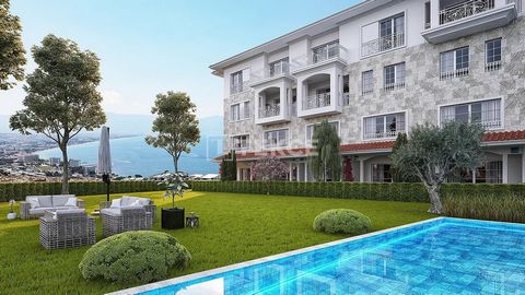 Sea-View Apartments in a Complex with Pool and Security in Kuşadası Aydın The apartments are located in the Kuşadası district of Aydın, Turkey. Kuşadası is a popular port city with cruise ships and a lively tourism atmosphere. It features ancient cit...