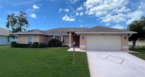 LOCATION! LOCATION! LOCATION! MOVE-IN READY! FULLY FURNISHED! POOL HOME! GULF VIEW ESTATES! LOW HOA FEES of $265 per year, NO CDD Fees, and Flood Zone X! VERY SPACIOUS! The Formal Living, Dining, Kitchen, and Family Rooms all have VAULTED CEILINGS! A...