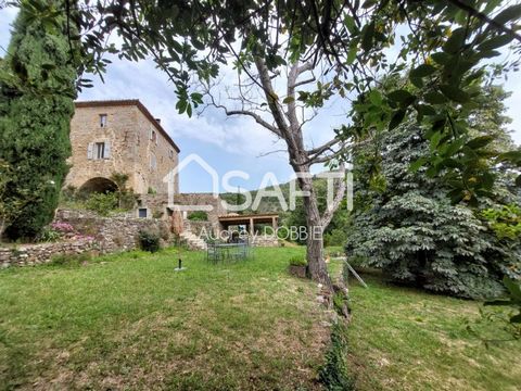 07460: Located in a dominant position in a charming hamlet at the gates of the Cévennes, Audrey Dobbie offers this beautiful stone farmhouse of 120 m2 habitable and its nice garden of 1975m2 with swimming pool. At 5/10 min from amenities, in a preser...