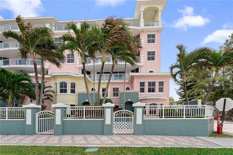 Welcome to this luxurious oceanfront townhome in Deerfield Beach's prestigious Ocean Plaza. This boutique condominium, built in 2003, offers exclusive amenities, including a private pool, fitness center, and 24-hour concierge services. The two-story ...