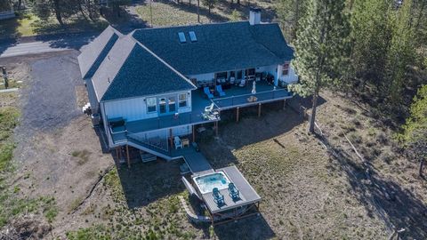 Calling all golfers, river and outdoor enthusiasts wanting a custom home w/ acreage along a seasonal canal and the Little Deschutes River! Explore this 3-bed, 2.5-bath home on nearly 4 acres that offers the ideal mix of luxury and outdoor living. Amp...