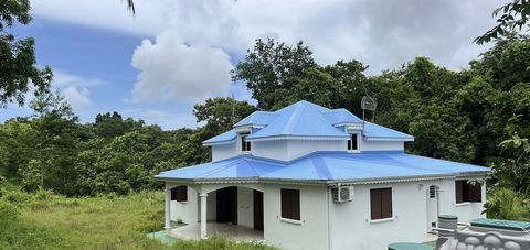 Antilles Immobilier Guadeloupe offers for sale this pretty villa of 258 m2 located in the countryside with a beautiful wooded plot of 2,229 m2 at 370,000€. It is located in a quiet residential area in Morne-à-L'eau. It consists of 3 bedrooms on the g...