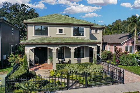 Welcome to 32801! Located in Orlando's most sought-after neighborhood and zip code, the prestigious Thornton Park District, this home offers an unparalleled location. This stunning, custom-built pool home seamlessly combines modern updates with timel...