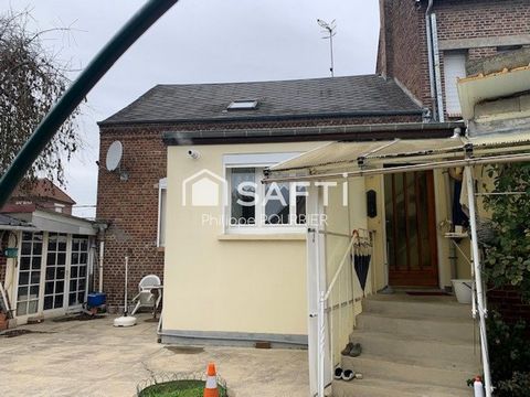 Jolie maison de ville en parfait état avec garage proche de tous commerces