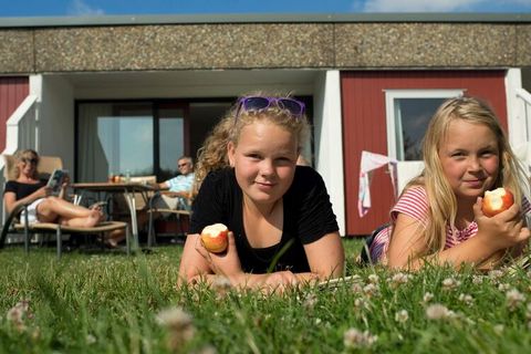 Stay in a former apple plantation in Allinge As the name suggests, the holiday park Æblehaven is located in a former apple plantation in Allinge-Sandvig. In this cozy area you will still find apple trees that blossom beautifully in spring, and in lat...