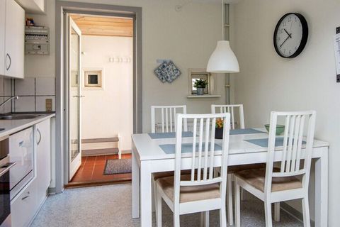 This holiday home is located on the southern tip of Rømø in the holiday centre of Rim with many activities, like the indoor and outdoor pool (seasonal), mini golf, tennis and playgrounds. Kitchen with open connection to the living room.