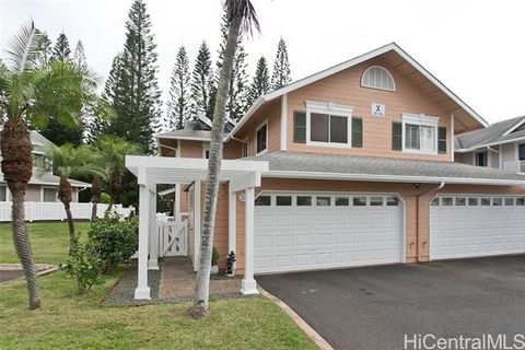 Absolutely beautiful 2-bedroom, 2 and a half bath end unit townhome in the centrally located neighborhood of Waikele, featuring a private, fenced yard with a tranquil golf course view. Enjoy an enclosed 2-car garage, plus two open driveway parking sp...