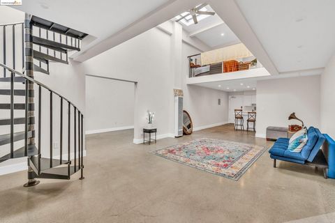 Welcome to 1451 13th Street, a stunning loft located in the vibrant neighborhood of West Oakland. This contemporary space boasts dramatic ceilings and open floor plan, creating an airy and spacious atmosphere that is perfect for modern living. Featur...