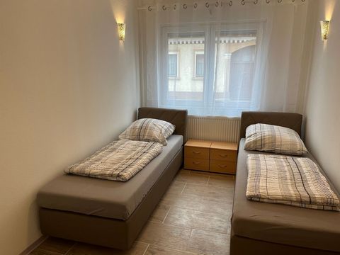 Bedroom: 2 single beds or double bed. Living room: TV, table, sleeping sofa. Kitchenette with fridge, induction cooker, sink, washing machine, microwave, oven, water heater, etc. Bathroom with shower, WC, sink. 1 Km (10 mins) to SAP, 50m to Walldorf ...