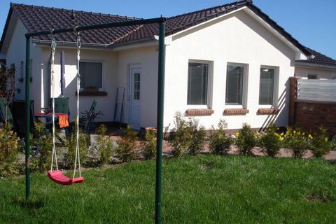 Our holiday home in the semi -detached house is located on about 1500 sqm of private property and is centrally located in the village. It is about 800 m to the beach. The holiday home has 2 bedrooms, living room, kitchen, bathroom, terrace, play and ...