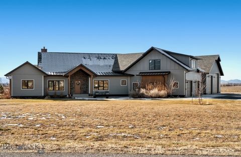 Welcome home to this incredible custom-built home seated on just over 1.7 acres backing to designated open space in one of Bozeman and the Gallatin Valley's most desirable neighborhoods, Spain Bridge Meadows. This beautiful 5 bedroom, 4 bath, 3 car g...