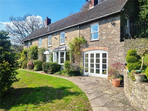 Perched in an elevated position on the outskirts of Clyro village, this charming detached three/four-bedroom period stone-built cottage is surrounded by approximately 1.4 acres of picturesque gardens and paddock land. Complete with a private driveway...