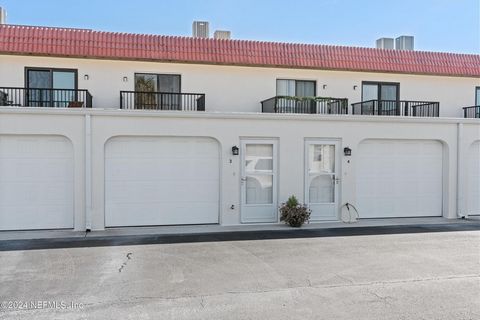 Quiet beachside community, steps from the ocean and beach. Rare opportunity for a 2 story condo at the beach with a garage and three different patios or decks for outdoor living! This 2 bedroom, 2 bath 1200 square ft. 2 story condo has a newly remode...