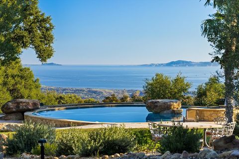 Private 9+ acre retreat overlooking Santa Barbara w/breathtaking views. French doors connect nearly every room to the unspoiled natural setting & to the expansive ocean & coastline view. Mature Oaks, Sycamore trees, prolific fruit orchard & gorgeous ...