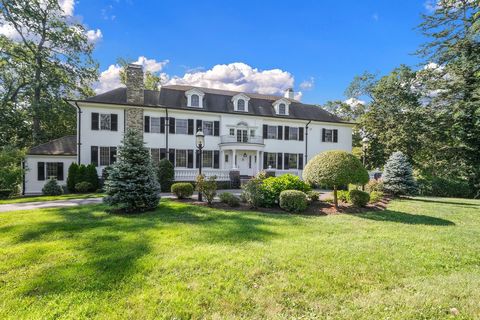 Majestic Colonial on 1.77 park like acres in a prime Greenacres location. You can't help but fall in love with this beautiful house and its property. You can go hiking in your own backyard. The grand foyer leads to an expansive living room with incre...