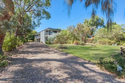 With mesmerising views across Western Port Bay to the coastline of Phillip Island, this superbly relaxed residence on an elevated 866m2 (approx) allotment offers peace and privacy as a permanent home or weekend escape brimming with holiday-rental app...