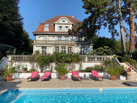 Exceptional: Nestled on a hill, in the most sought-after area of Mulhouse, close to the botanical and zoological garden, 5 minutes from the train station (TGV Paris 2h40), close to the motorway (15 minutes from Basel-Mulhouse airport and 30 minutes f...