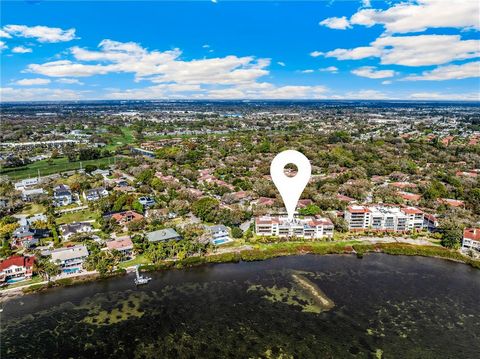 Million Dollar View from your balcony! You can see the lights of Downtown Sarasota at night. Kayak on the Bay from your backdoor. Mature landscaping, thoughtfully designed floorplan and the incredible view make this hidden gem an exceptional home and...