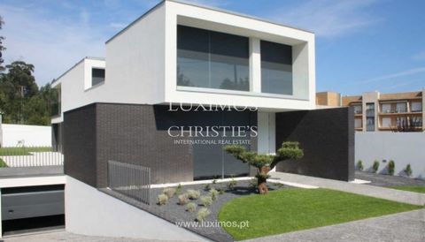 Constructed using premium materials and designed by architect Raulino Silva, this four-bedroom luxury villa is exceptional. It comprises a total of three floors . A five-car garage and a two-car porch are located in the basement, along with a washing...