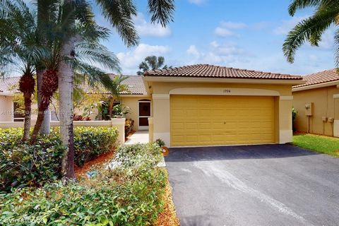 Beautiful, 2-bedroom, 2-bath, 2-car garage villa in The Hammocks. This home features new, SS appliances, new carpet in the bedrooms, tile in the living areas, a cozy, screened and covered patio and the interior was just painted. The Hammocks is a sma...