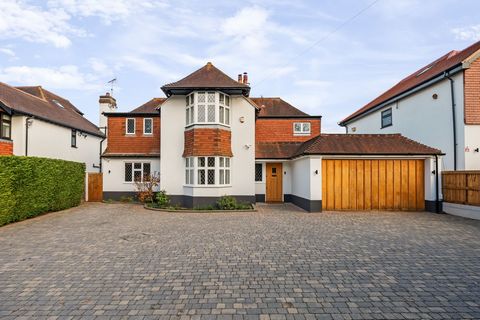 GUIDE PRICE £1,400,000 TO £1,500,000 We are thrilled to present this exceptional chain-free four-bedroom family home, an incredible opportunity to secure your dream home. This spacious property offers generous room sizes throughout, perfectly designe...