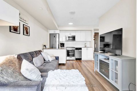 Location, Location, Location!!! Welcome To This Pristine East facing 2-bedroom, 1 Bath Unit In A New Modern Building Offers A Bright & Open Concept Layout With a Modern Kitchen with over $5k in upgrades from the EKO high gloss cabinet and kitchen Isl...