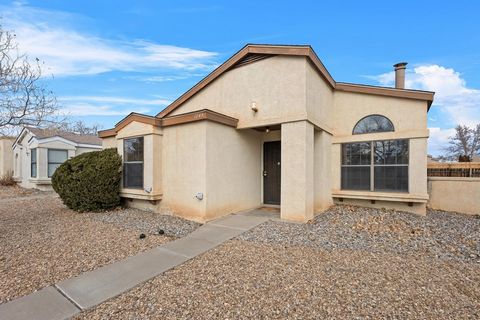 Welcome to this charming home in the heart of Rio Rancho! This beautiful 2 bedroom, 1 bath home offers an inviting blend of comfort and a great outdoor living space with year round green (synthetic) grass by Syn Lawn. Enjoy the heat of the wood stove...