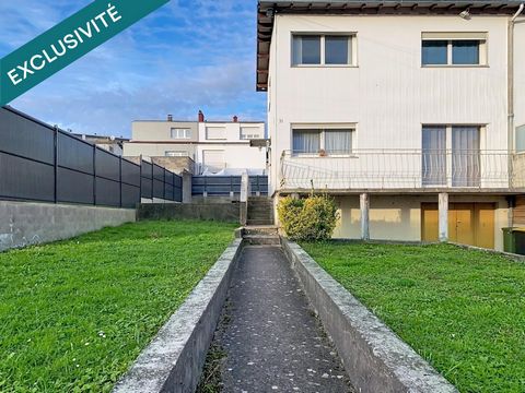 Maison avec garage et jardin