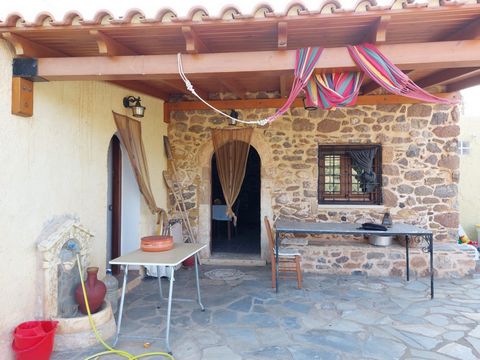 Myrtidia-Sitia, East Crete: Great stone house with garden just 2.5km from the sea. The property is 66m2 located on a plot of 500m2 with fruit trees and flowers. The stone house consists of a living area with fire place, a kitchen, a bathroom, a fanta...