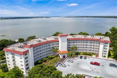 New price reduction!!! Enjoy sweeping lake views and sunrises over 4,000-acre Lake Dora. The 5th floor center unit offers direct lake views from floor-to-ceiling windows and from the heated pool deck. Stroll 2 blocks to Mount Dora's quaint downtown f...