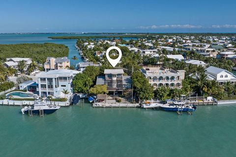 Timeless Waterfront Charm in Venetian Shores, Islamorada - Indulge in classic charm with this meticulously positioned waterfront residence in sought-after Venetian Shores. A dream come true for those who appreciate spectacular sunsets and unparallele...