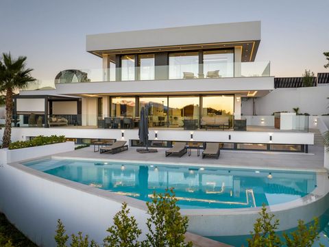 Villa Alma stands as an exemplar of modern architectural excellence, gracing Nueva Andalucía with its striking presence. Its sleek, white exterior and expansive floor-to-ceiling windows define its contemporary allure, while its southwest orientation ...
