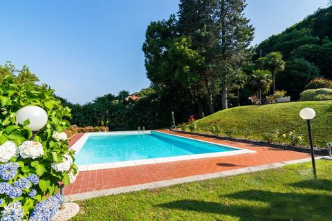 The cozy apartment has 2 bedrooms and can host up to 4 people. The property has a swimming pool, terrace and a garage and is ideal for small groups or families. The apartment is on the Lago Maggiore (Lake Maggiore) and is just across the road from th...