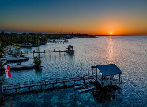 Fabulous price on this bayfront property on Plantaion Key! Make this your bayfront estate and enjoy all that Islamorada has to offer. Fully fenced for privacy, this property offers breathtaking bay views and an irreplaceable tiki at the end of the do...